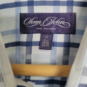 Men's French cuff shirt, size medium but may fit a slightly larger person.